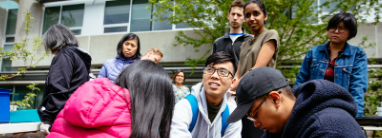 Volunteers gathered outdoors at an Embark Sustainability Society community outreach event