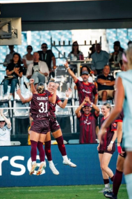 Northern Super League player celebrating a goal, used in a social media recruitment campaign